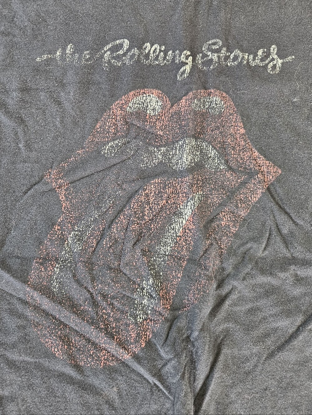 the Rolling Stones Black Tee with Red & White Tongue Graphic